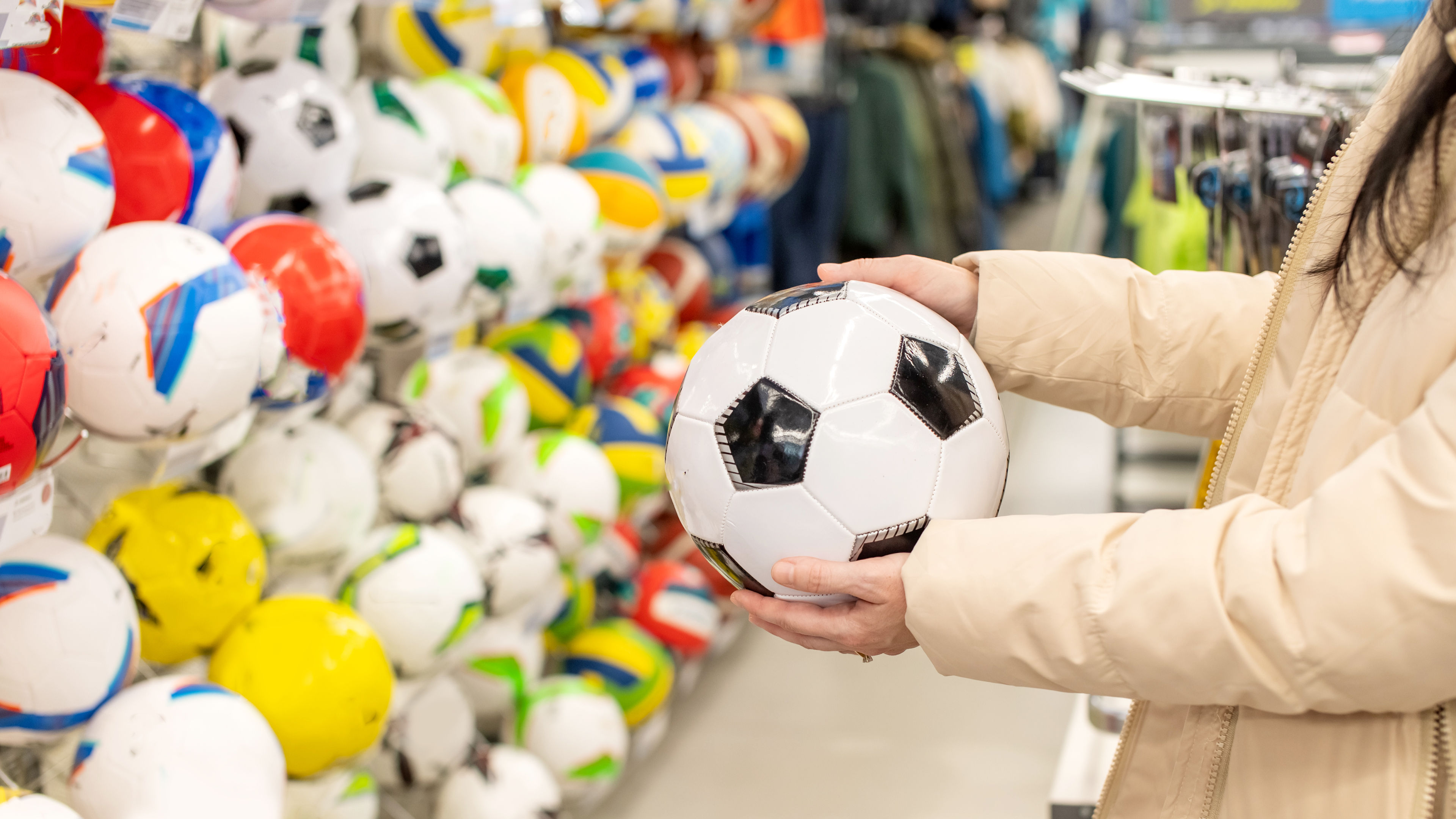 A soccer ball in hand 