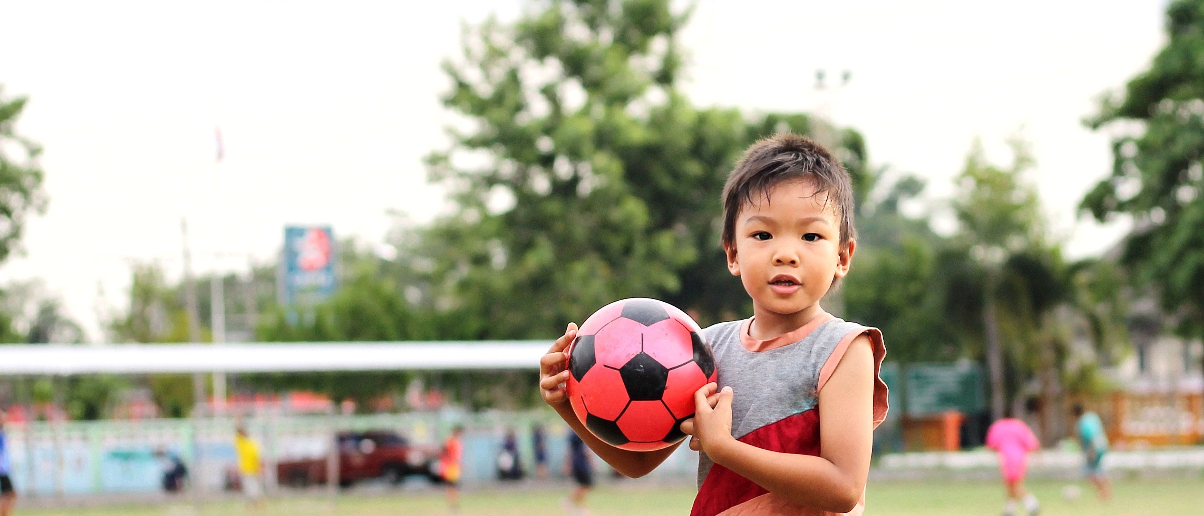 Kid with football in his hand