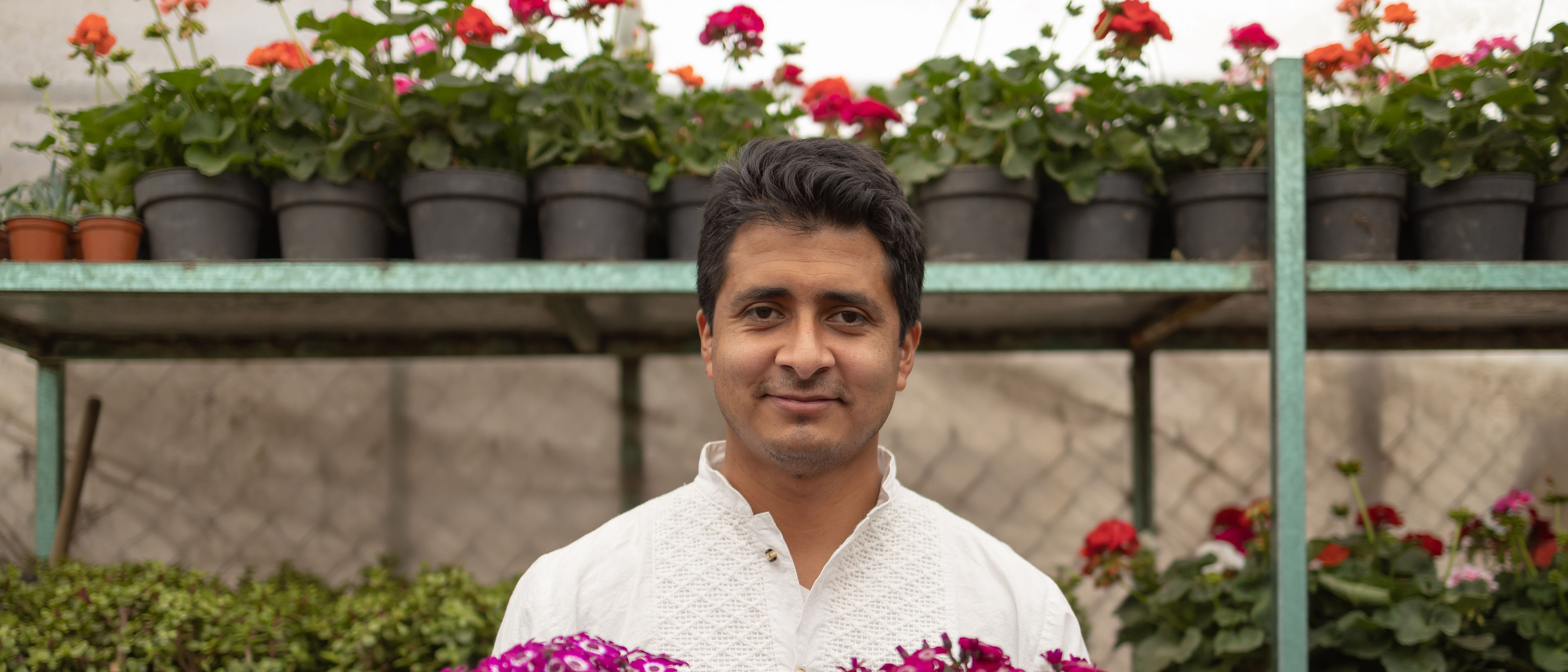 Gardener with new plants