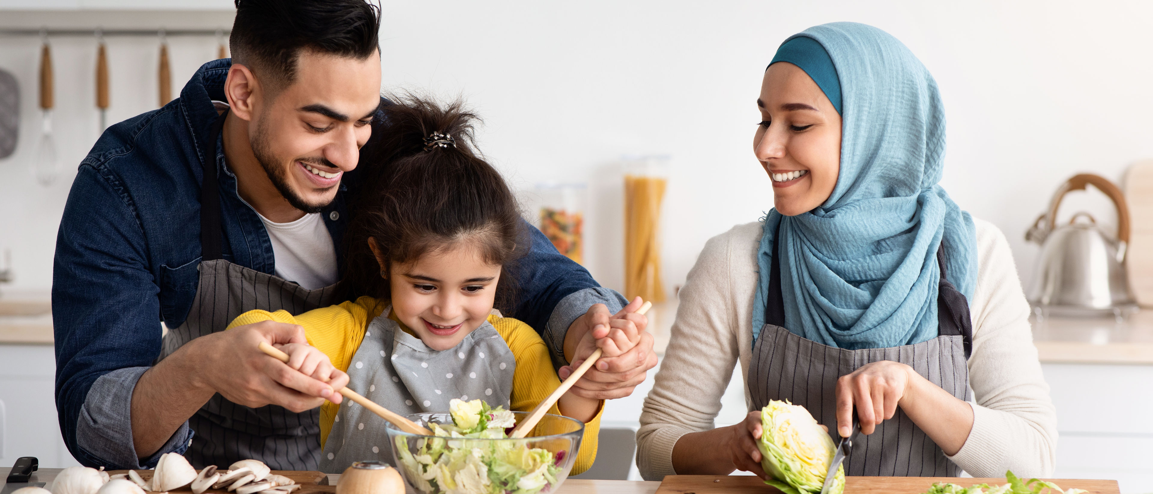 Happy family cooking together