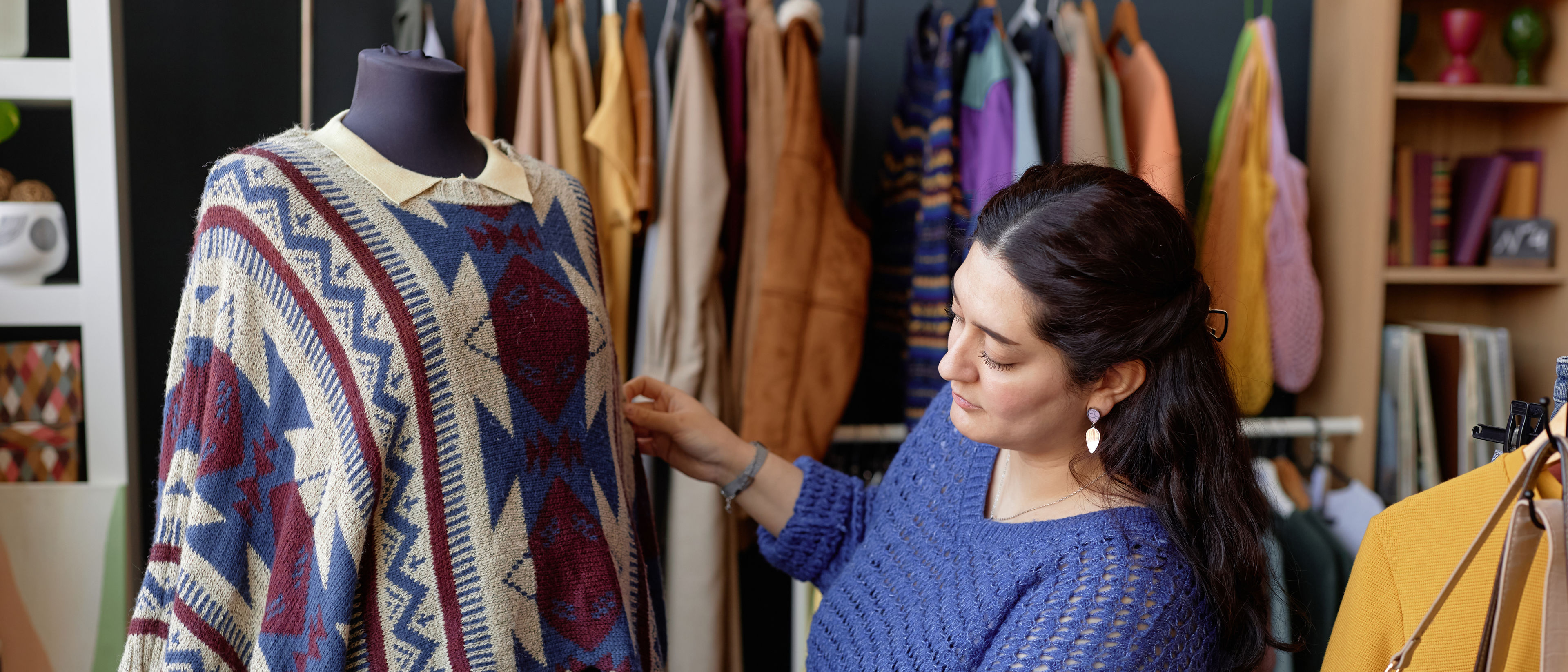 woman looking at a dress 