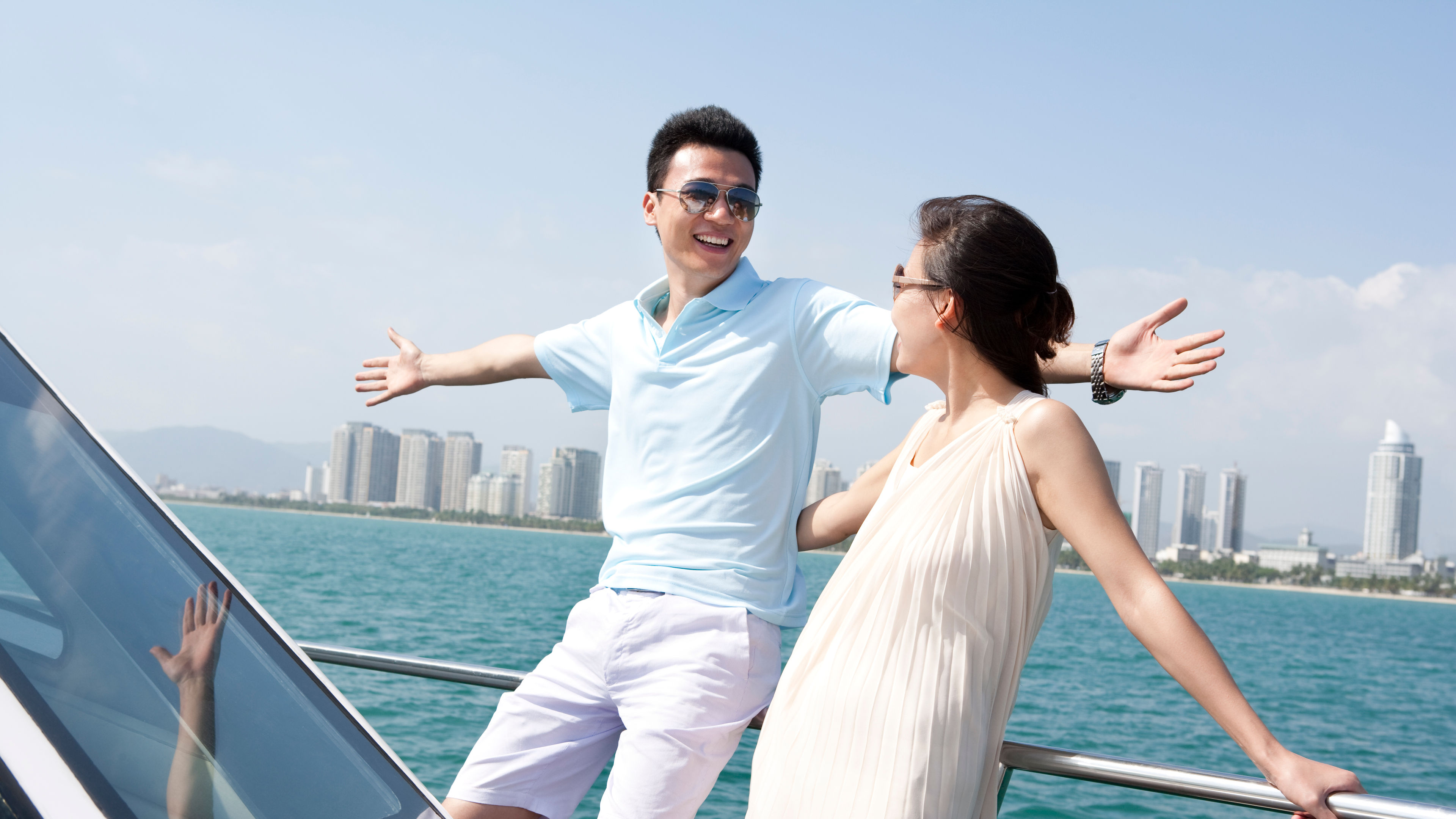 couple relaxing on a yacht 