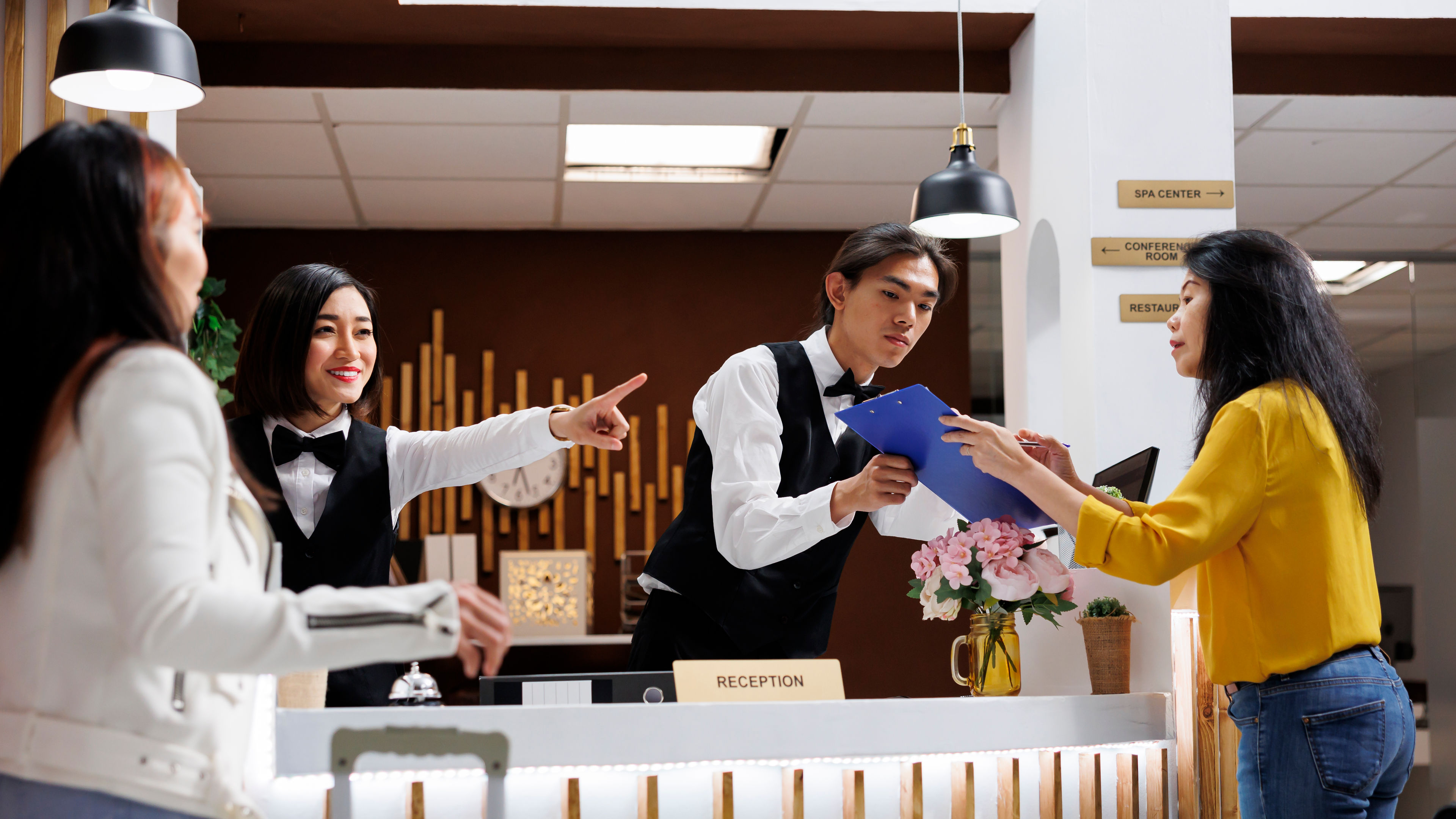 Hotel guest receives registration form 