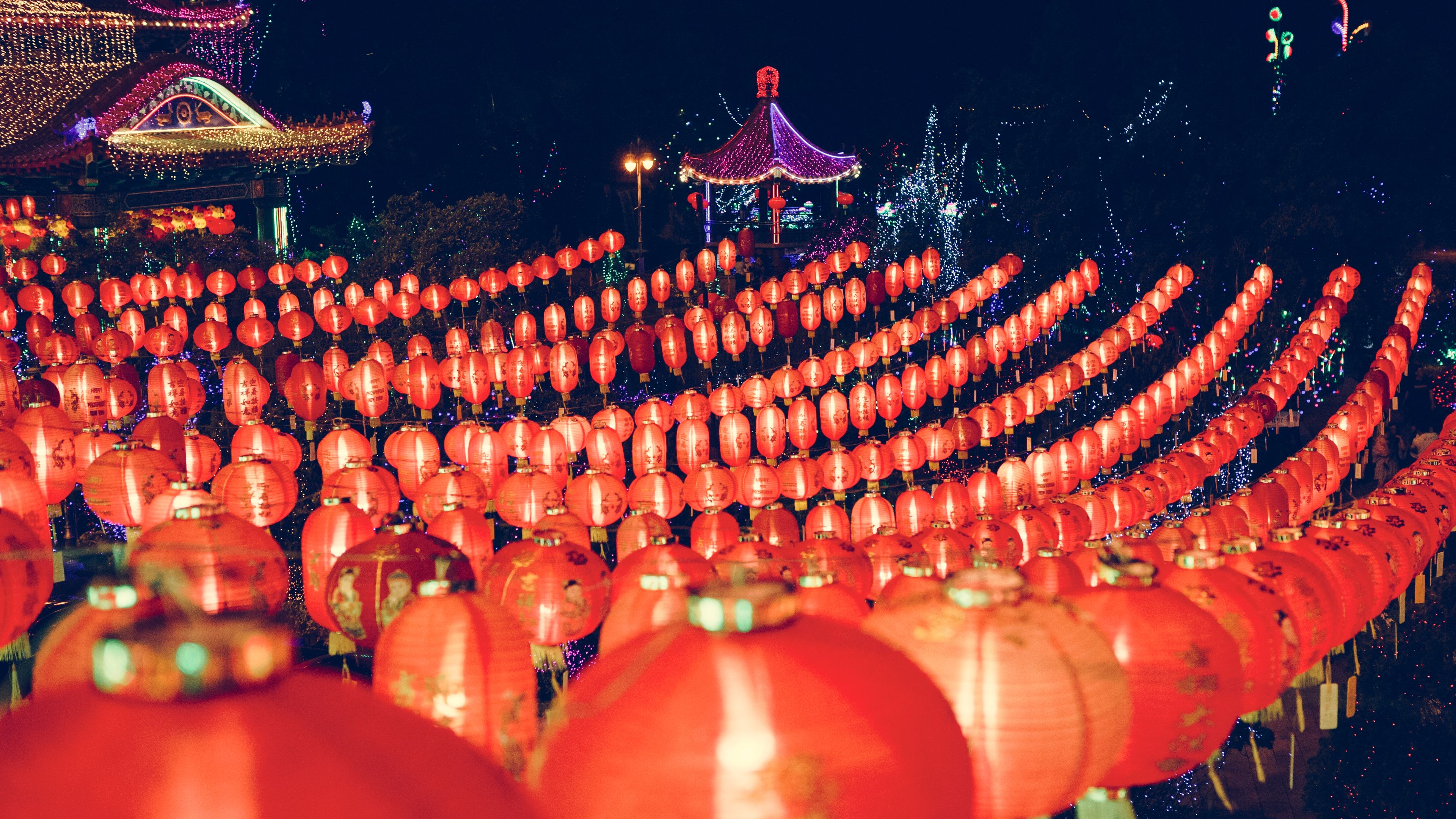 Rows of glowing red lanterns create a magical atmosphere during the Chinese Lantern Festival at night 