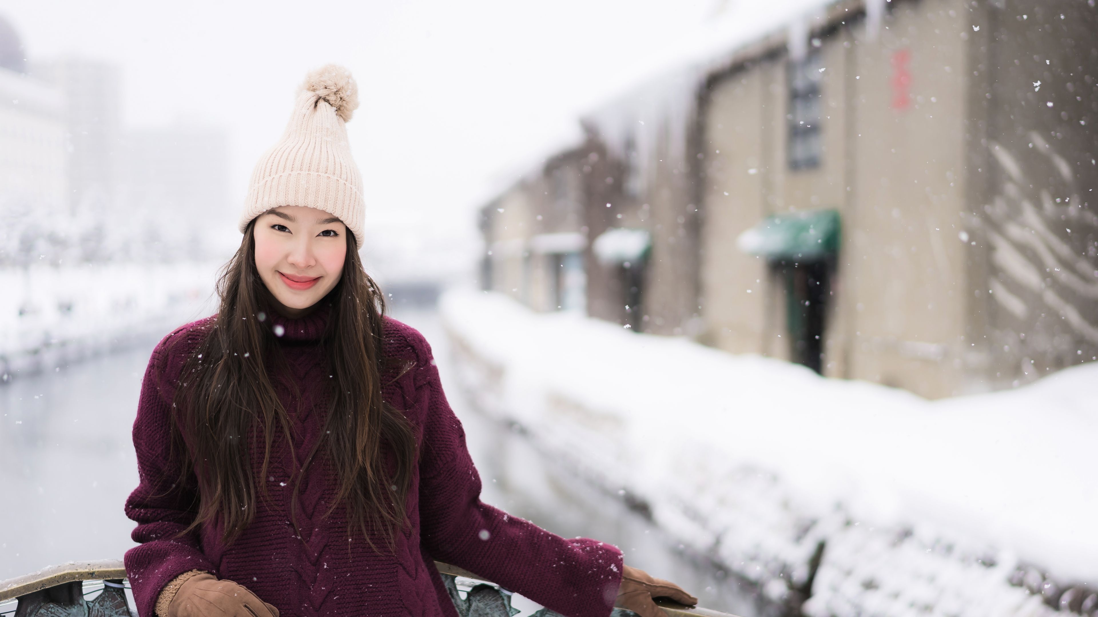 Woman enjoying snowy winter 