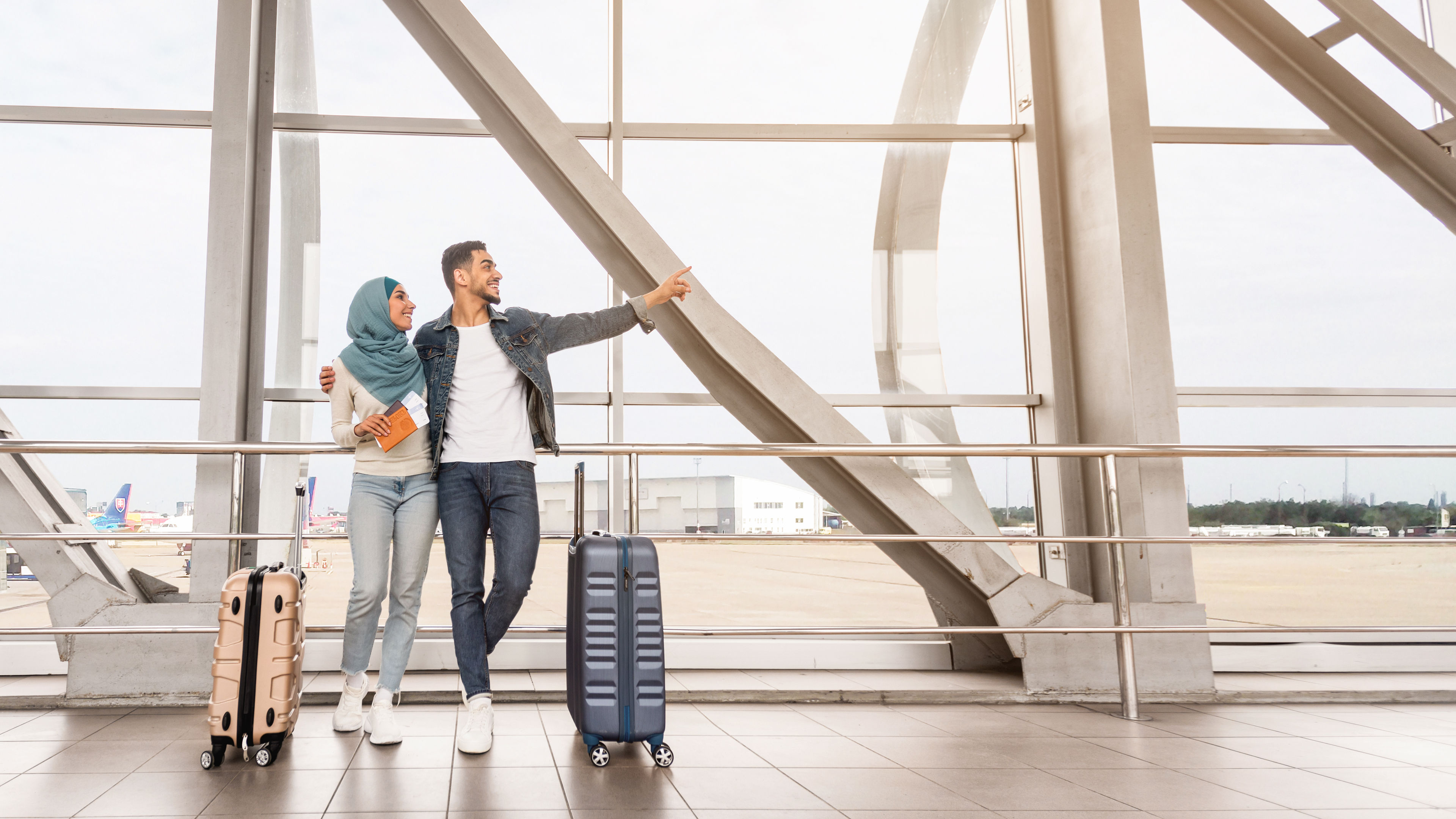 Excited travellers at the airport 