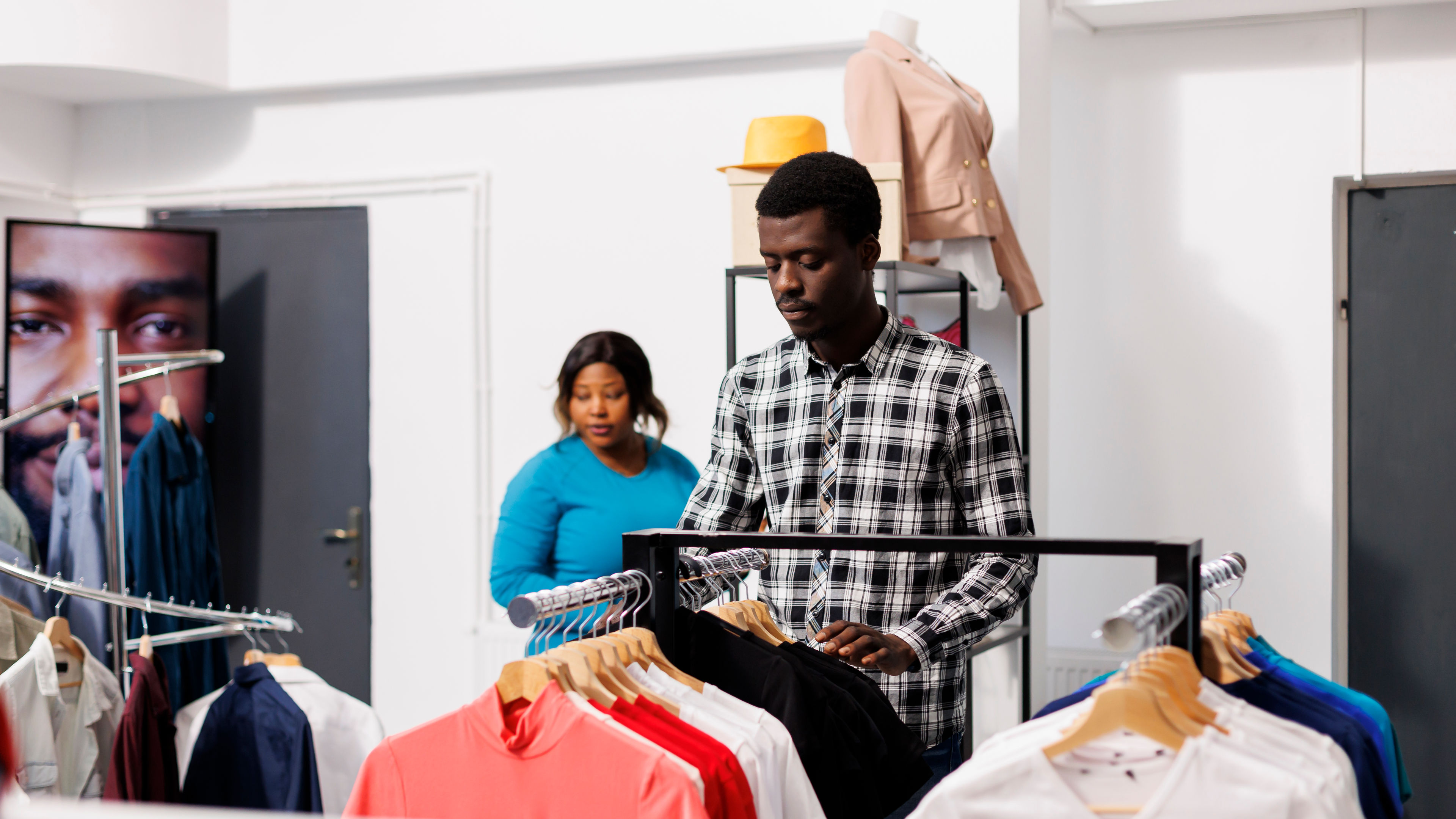 Man looking at new fashion collection