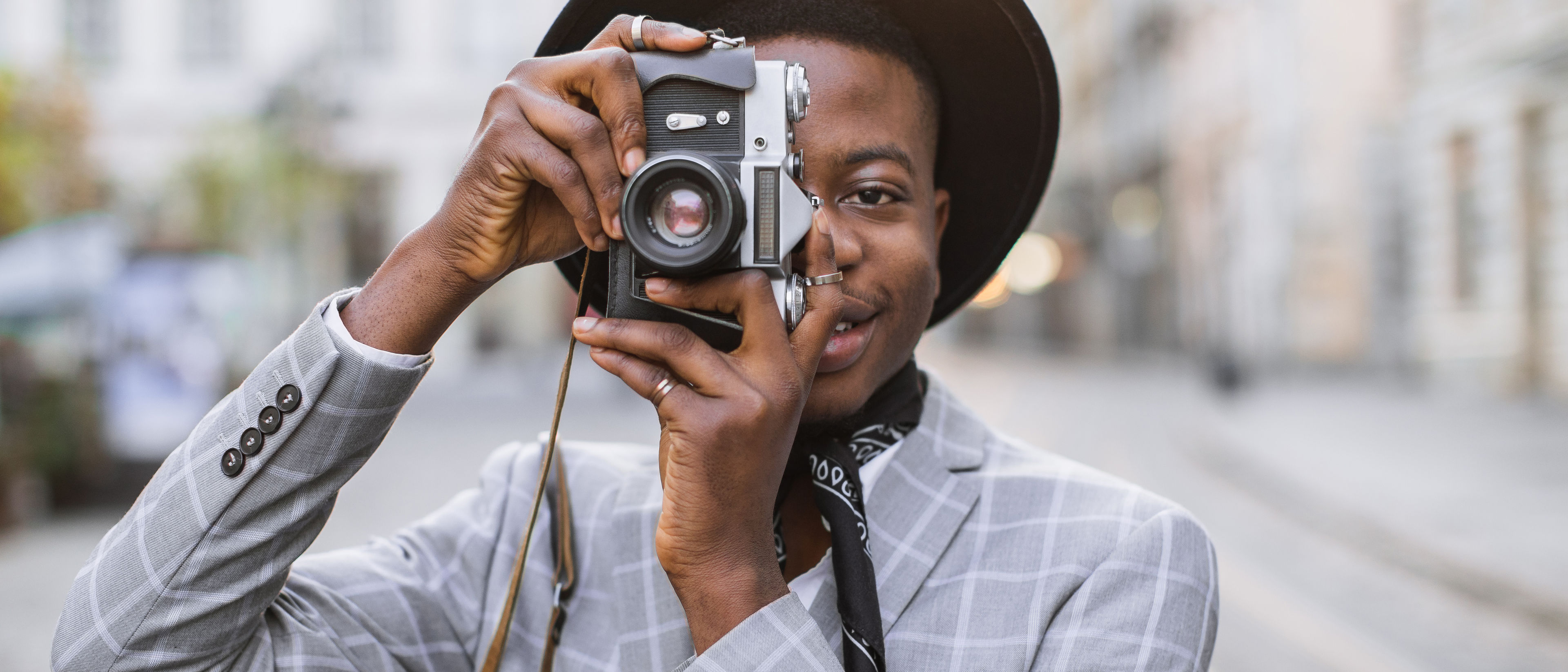 Man taking photo using camera