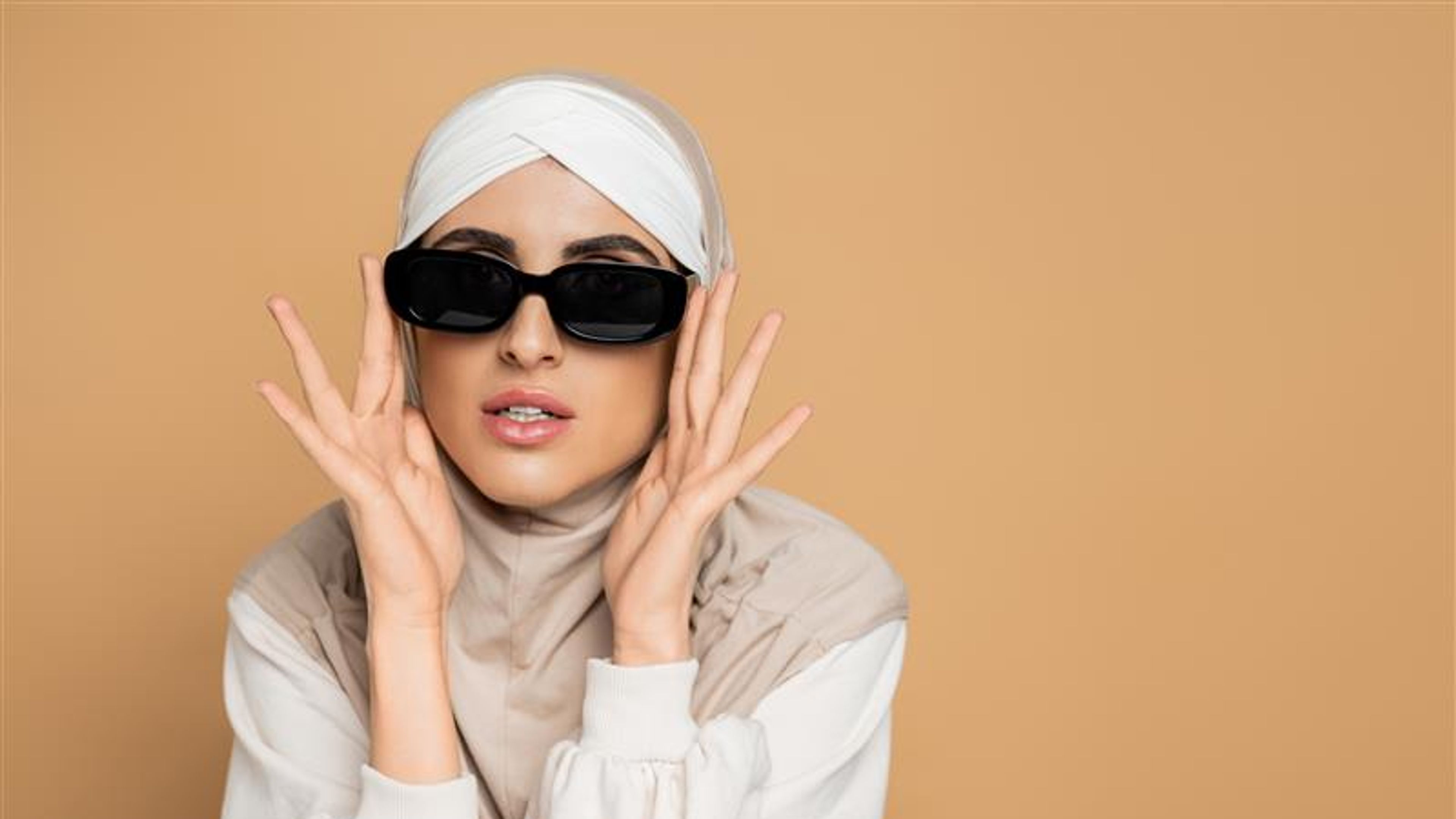 A woman wearing sunglasses 