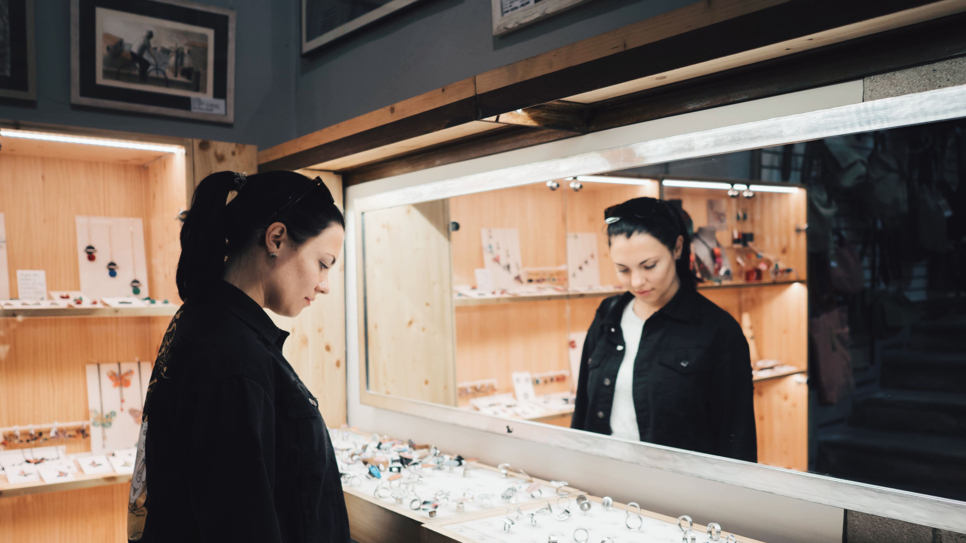 Woman choosing ring.