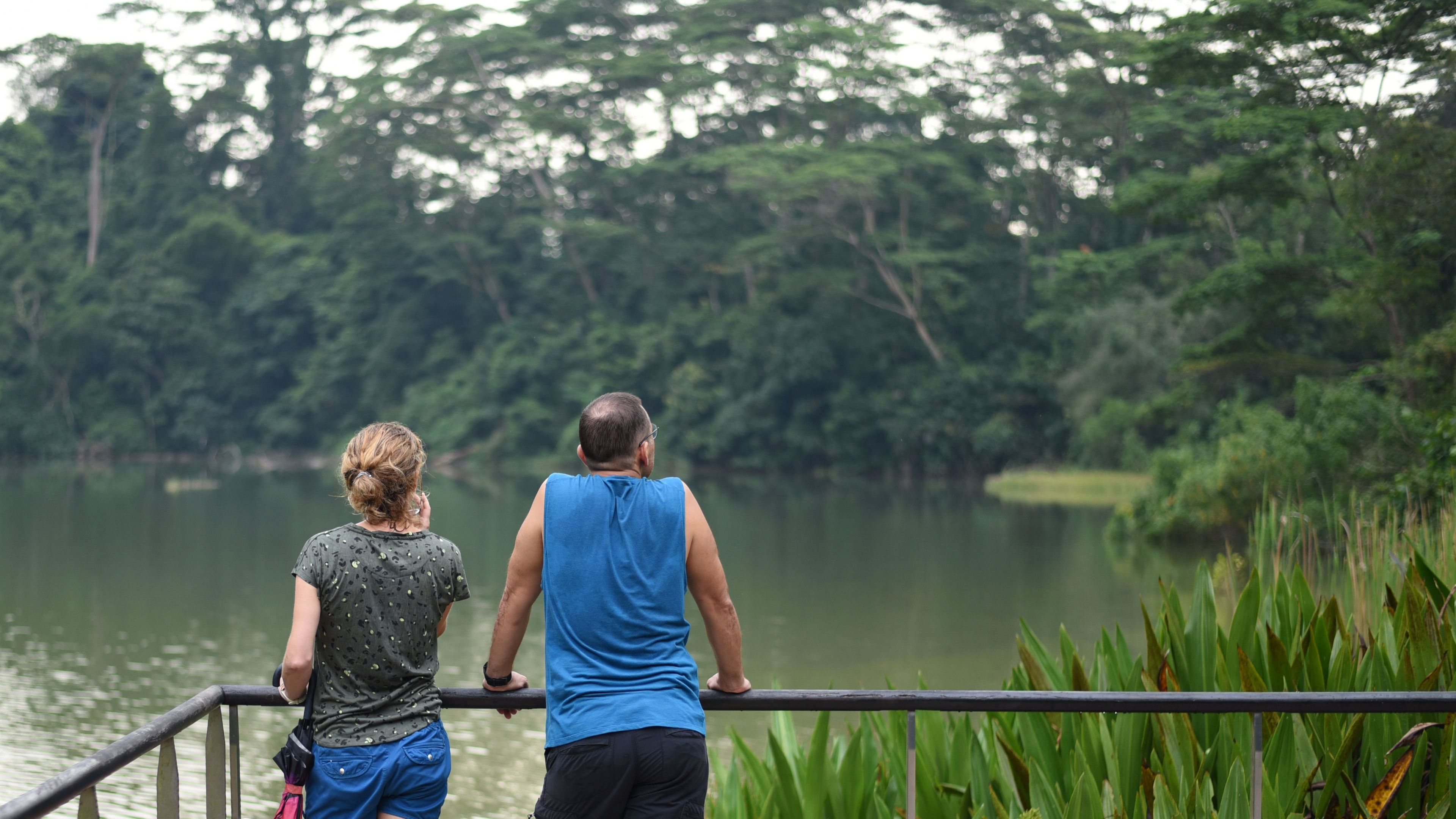 A couple looking at the lake 