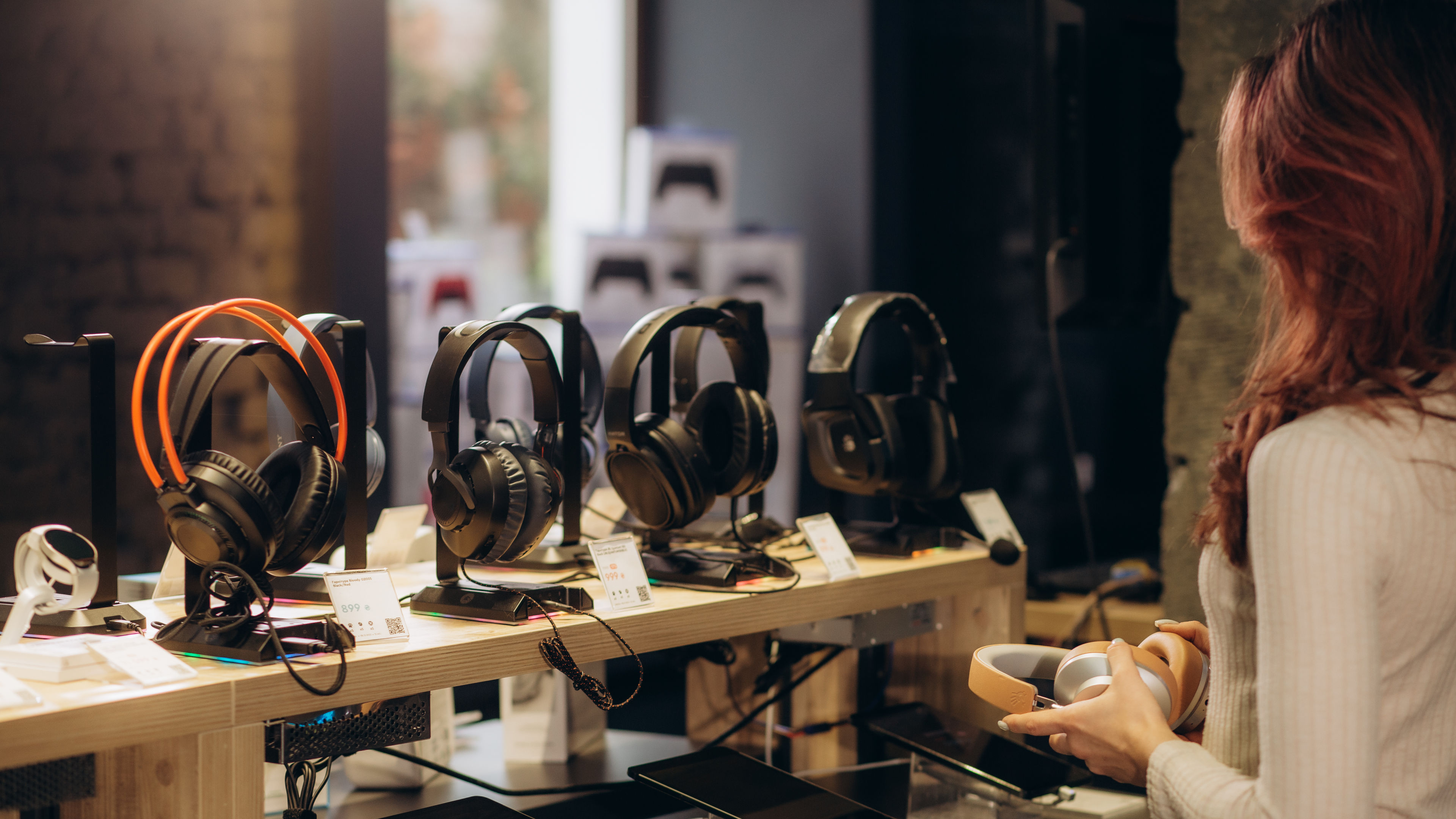 A row of different headphones 