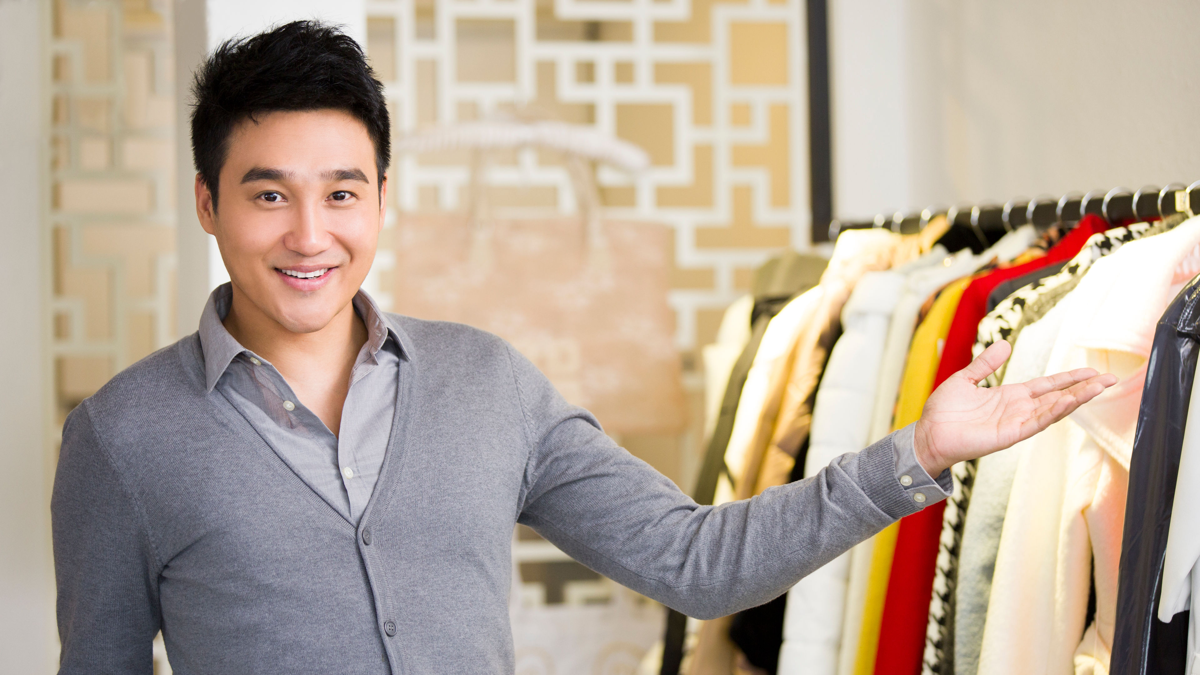Image of a guy in the cloth shop