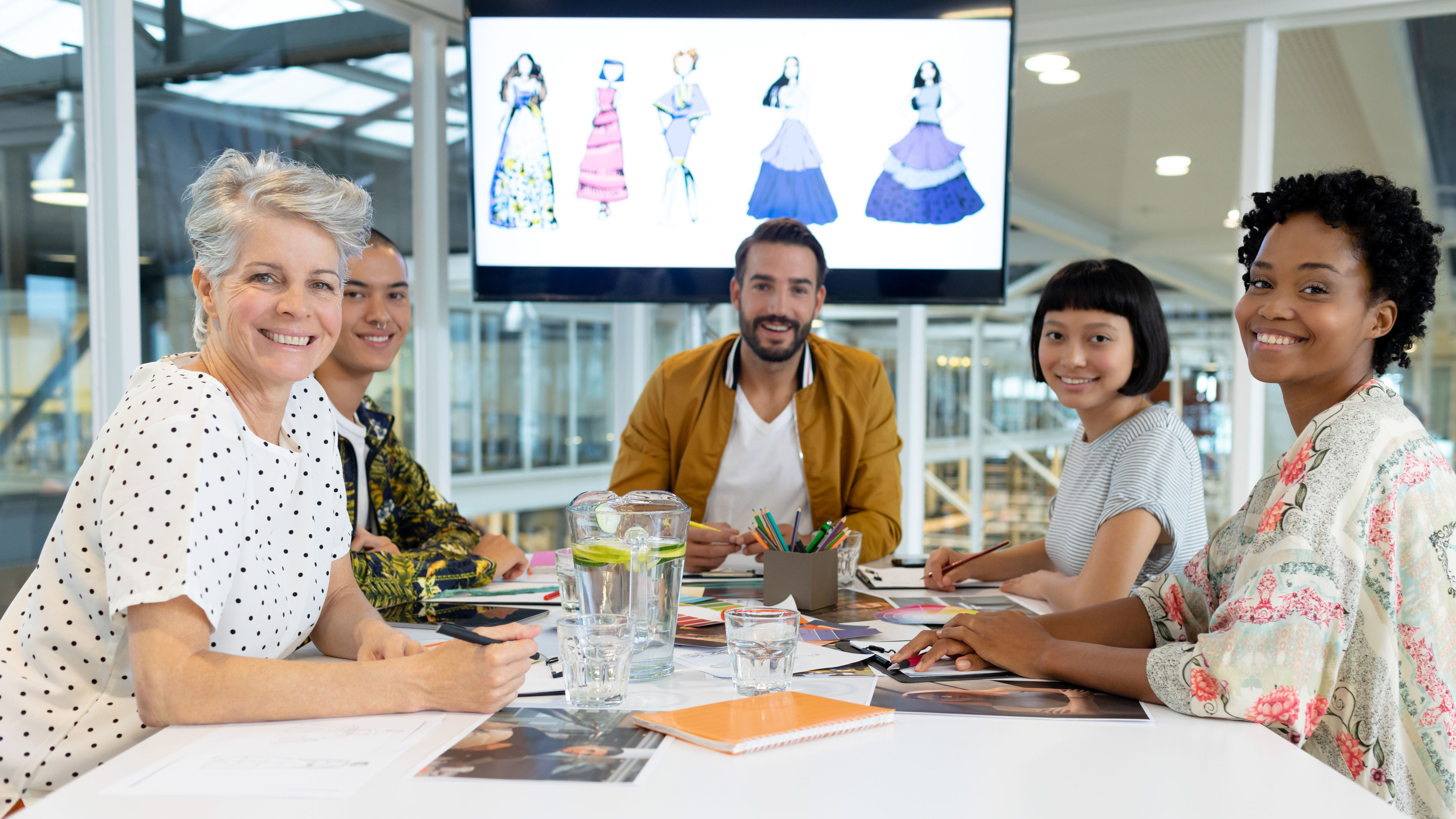 Front view of diverse business people discussing in the meeting at the conference room in the office 