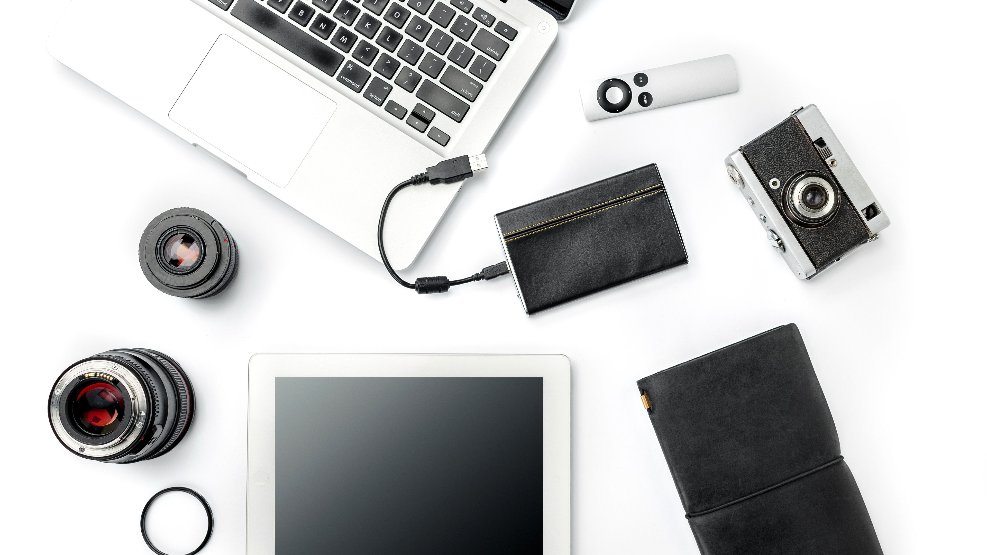 Image of Laptop and accessories in a table 