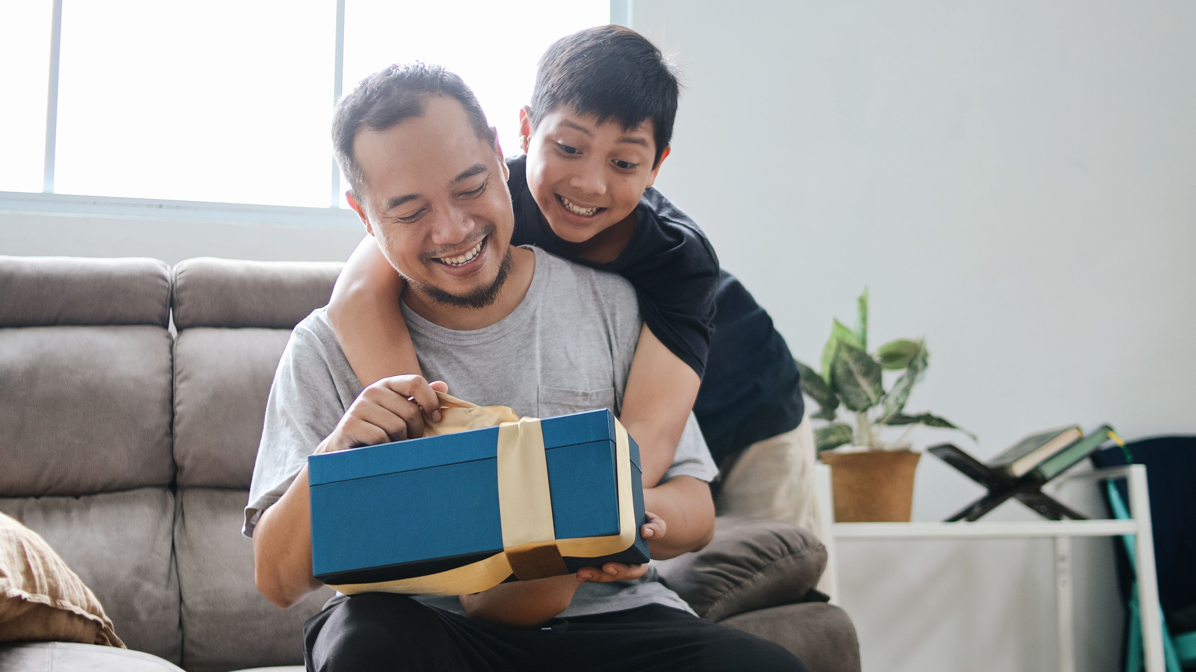 Son Embrace Father And Giving Surprise to Celebrating Father's Day 