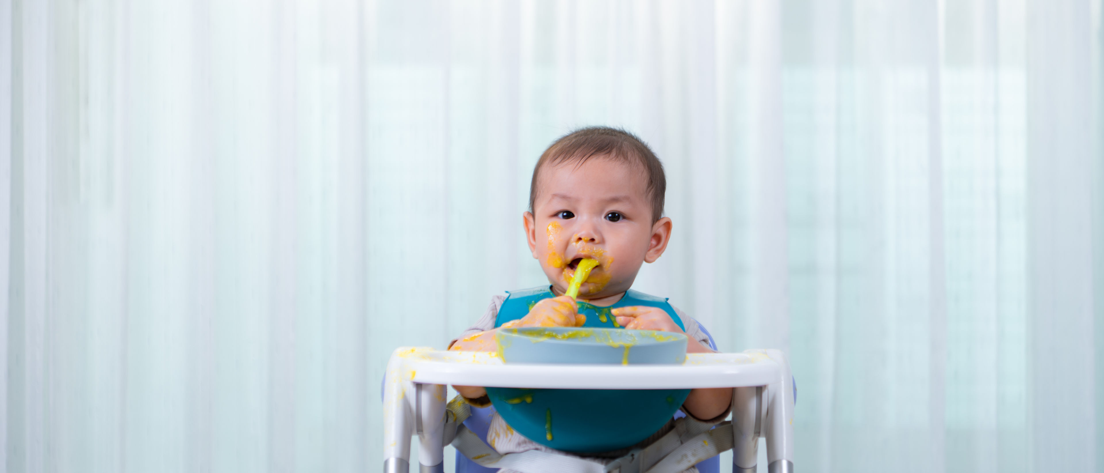 A little child eating his meal