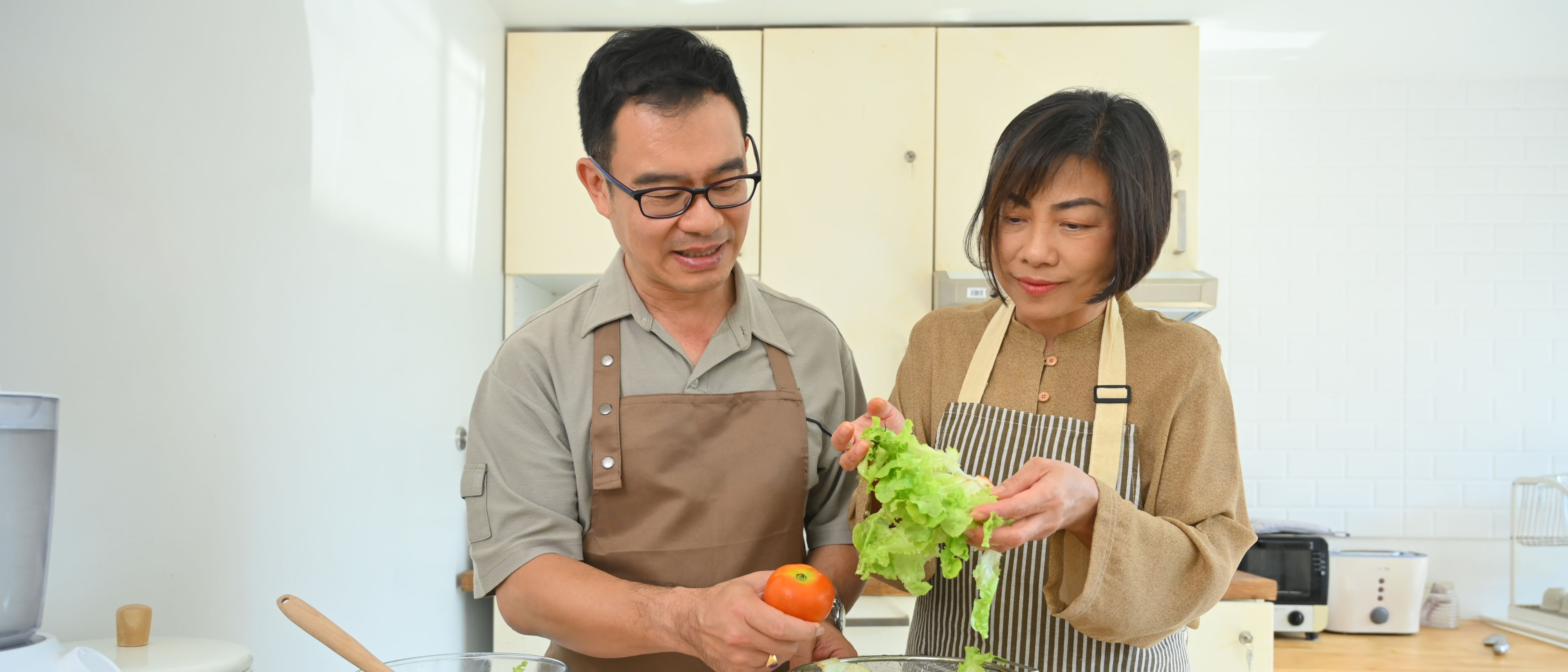 Couple preparing food together