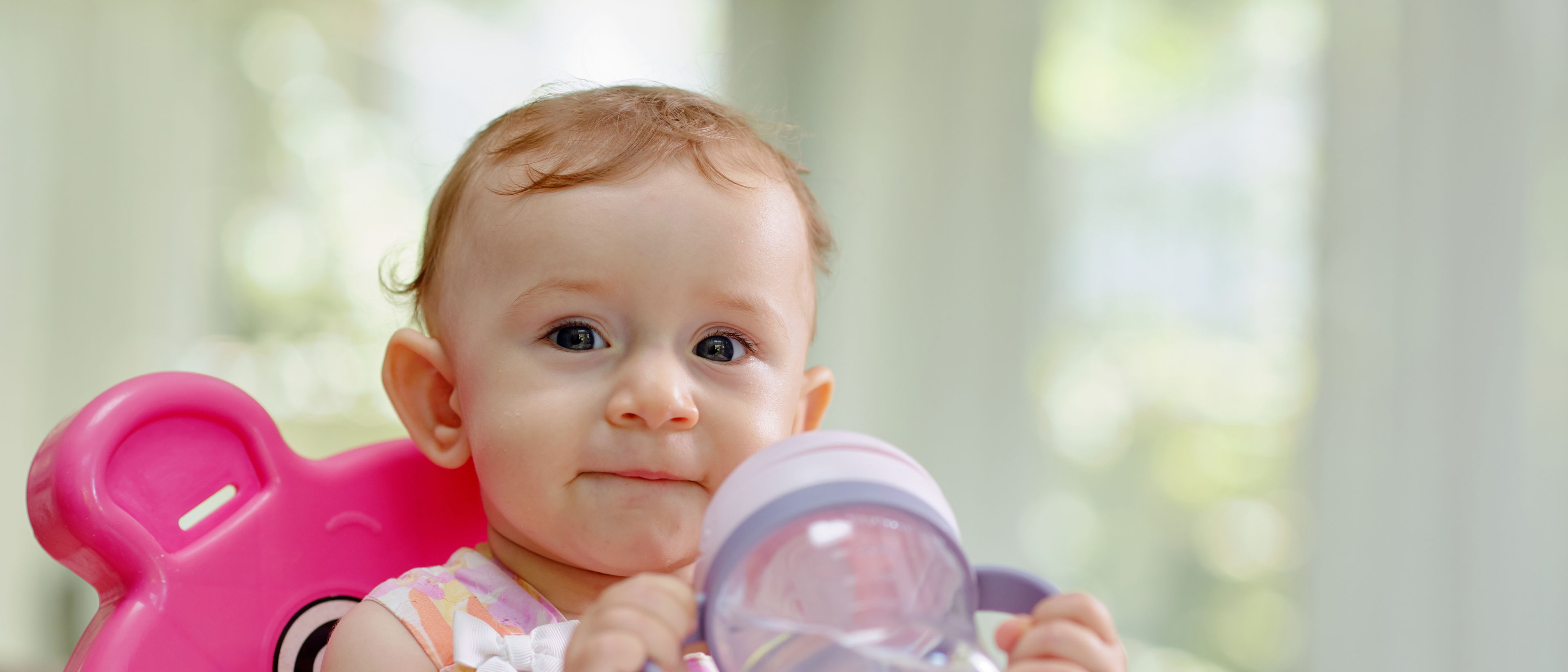 baby with feeding bottle