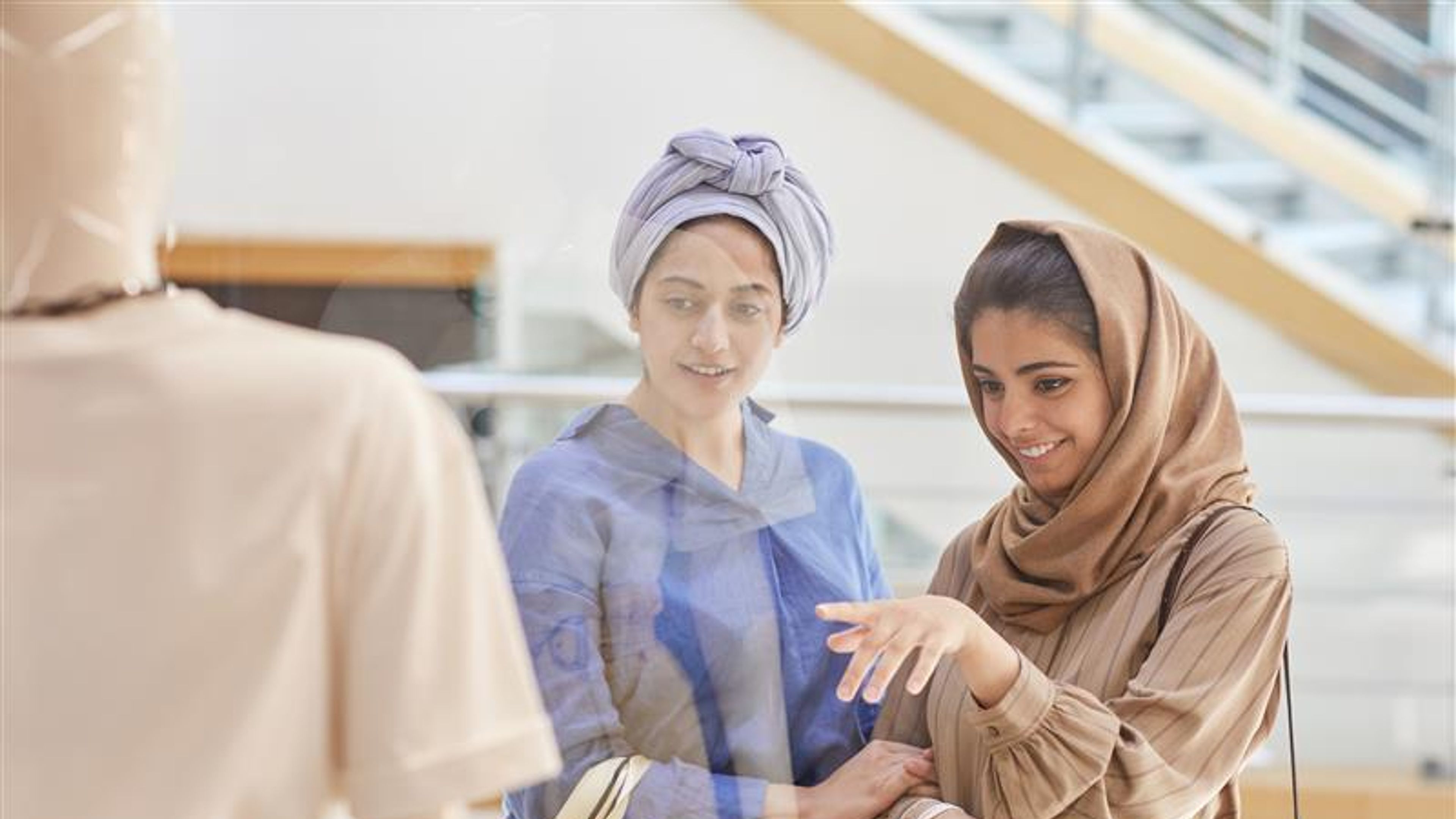 Middle-Eastern Women Looking at Displays in Shopping Malls 