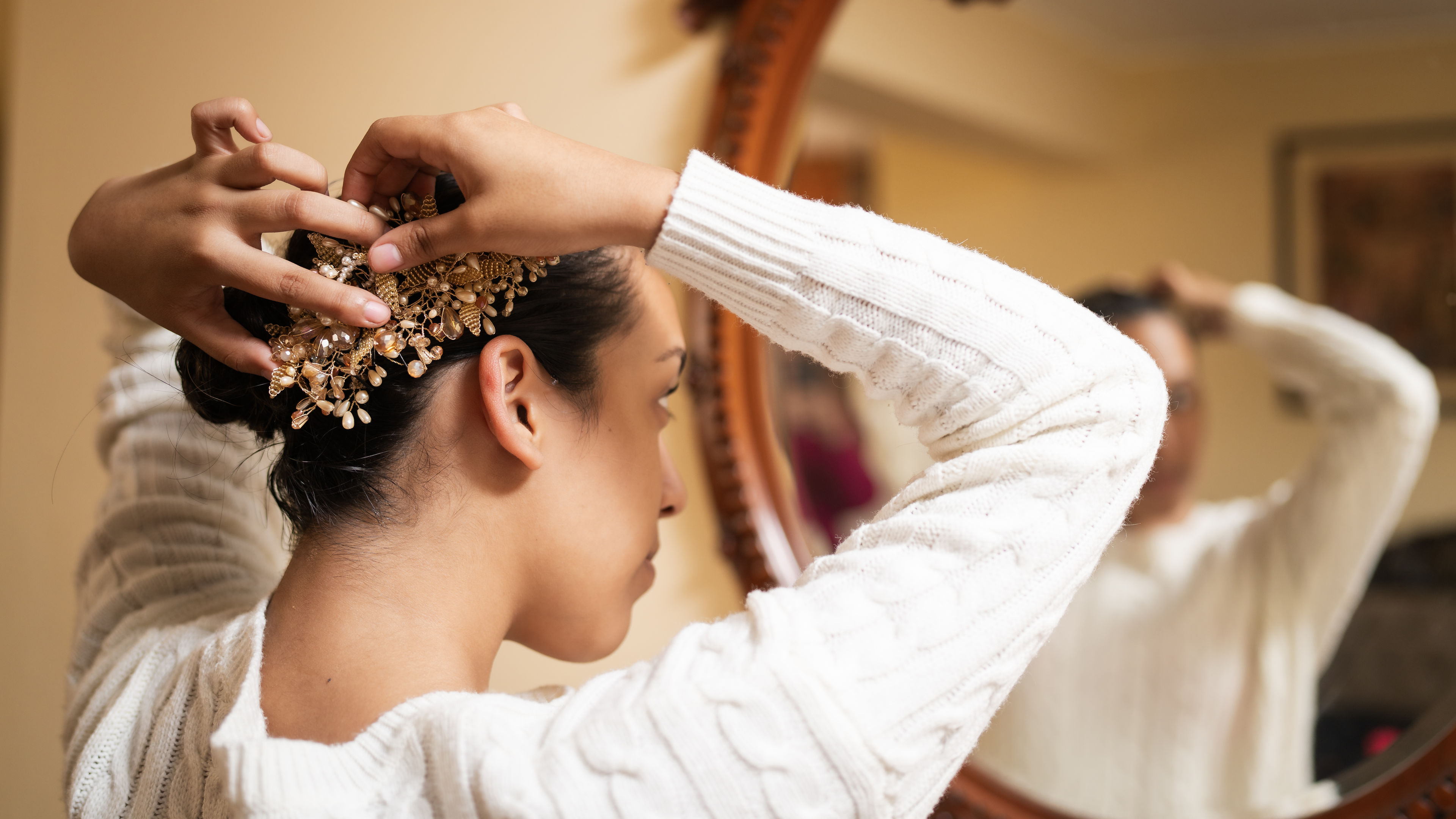 Woman putting hairpin 