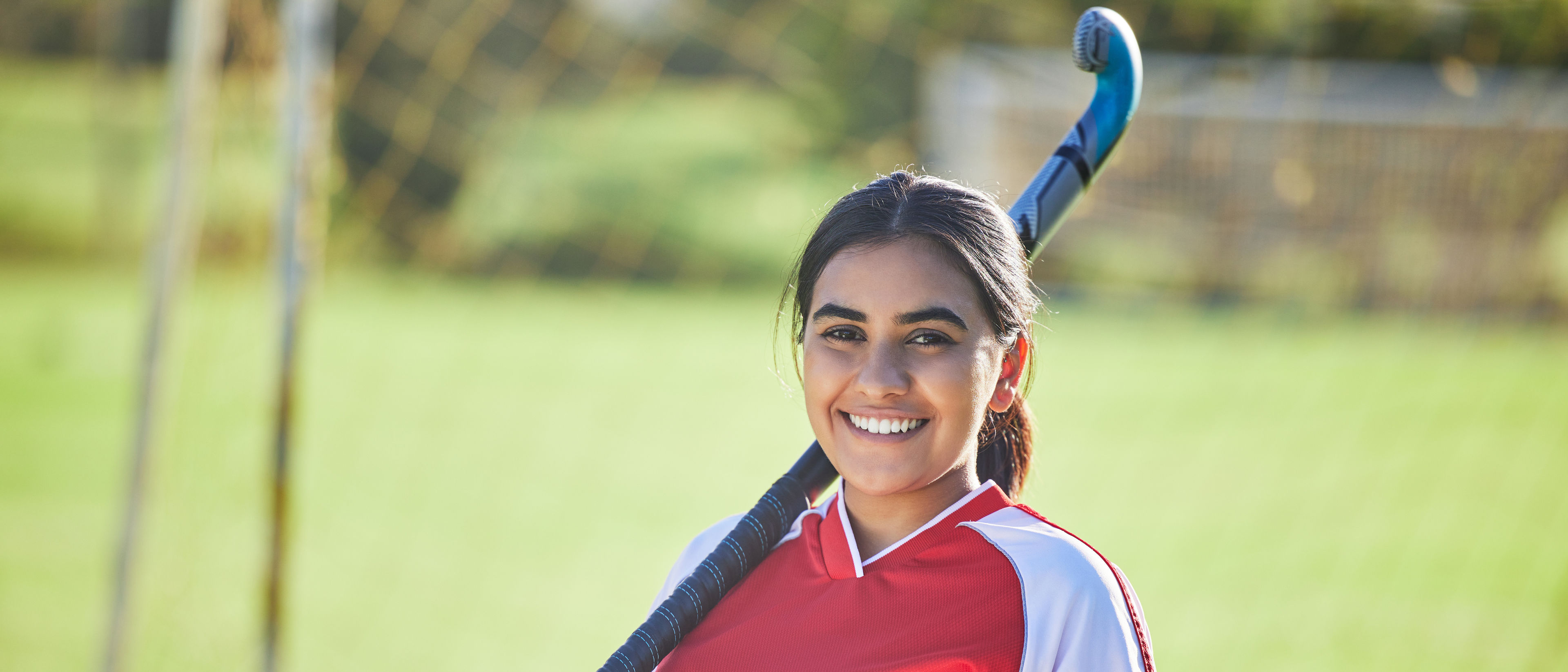 Woman with hockey stick