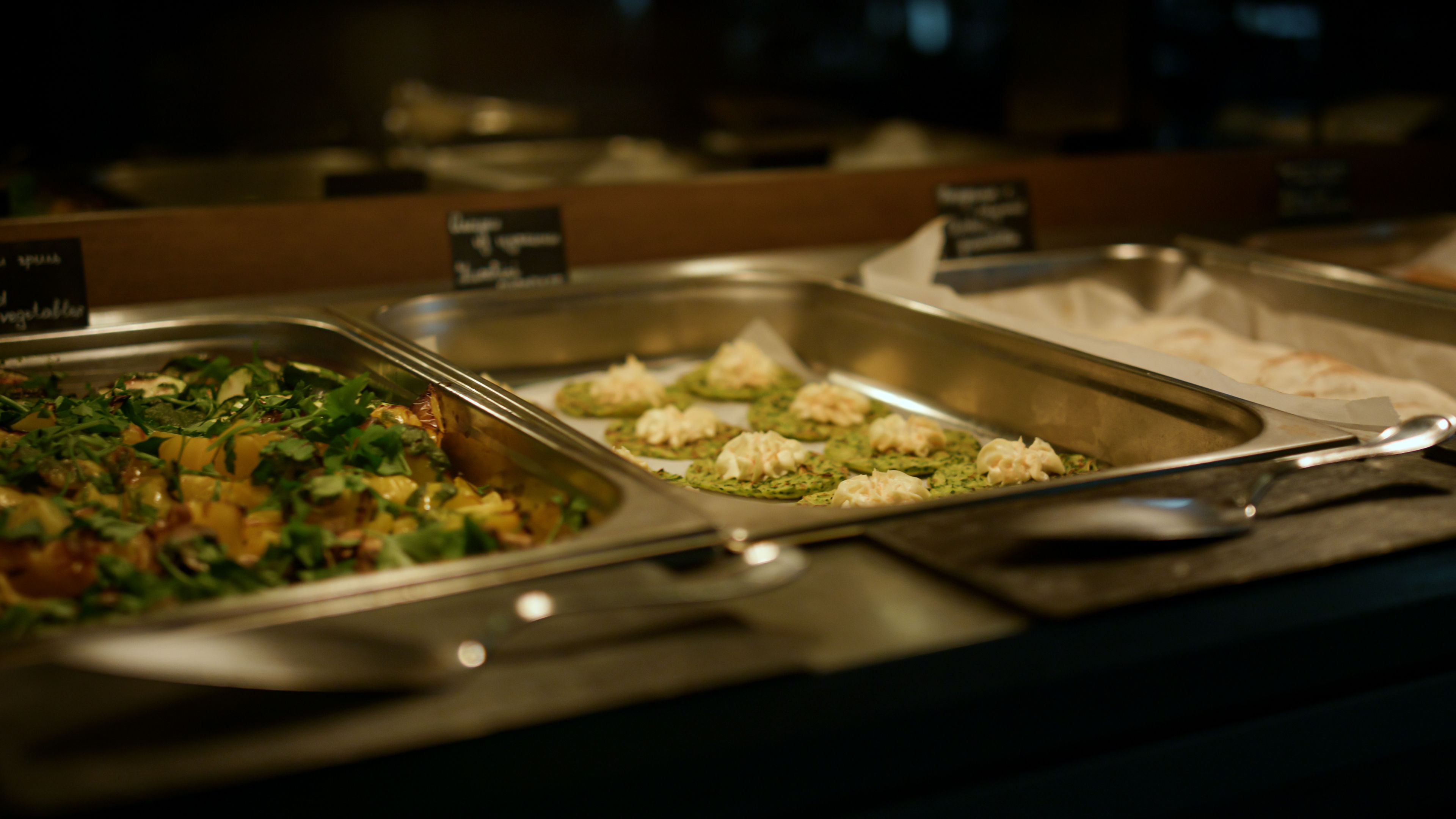 A buffet food setting in a hotel 
