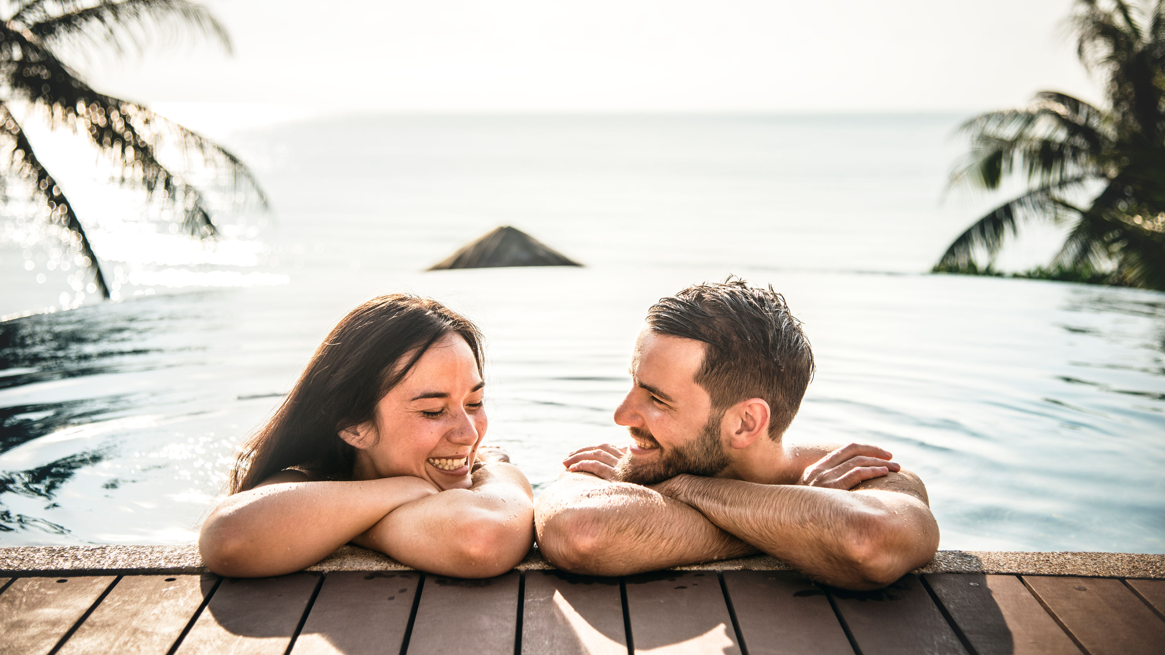  Couple relaxing in a swimming pool 