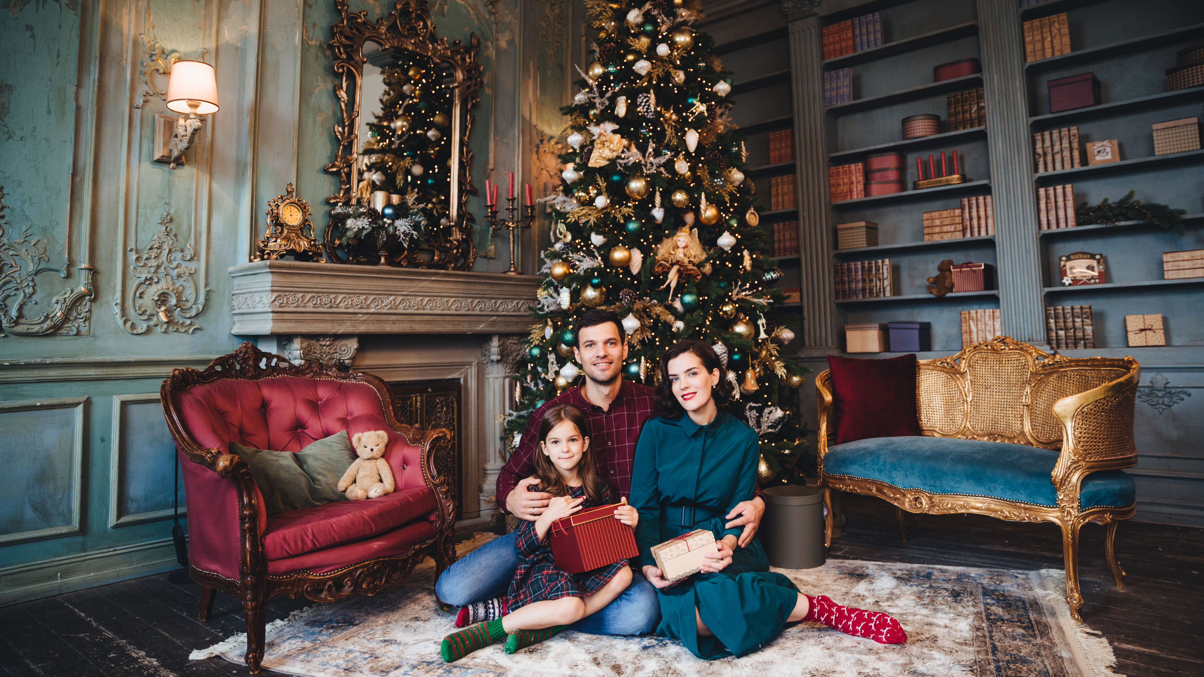 Image of a family near xmas tree 