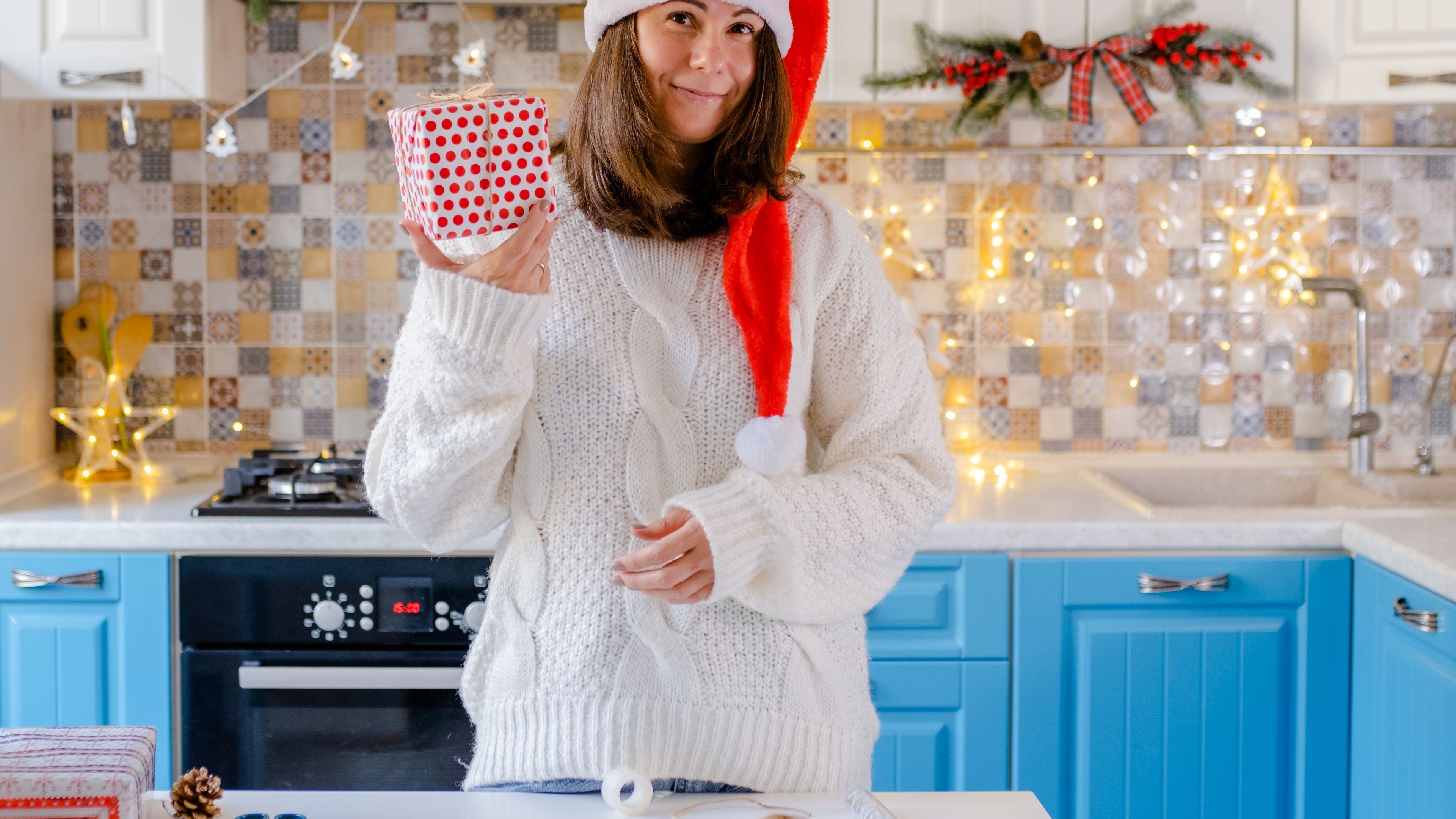 Image of a happy woman with a gift 