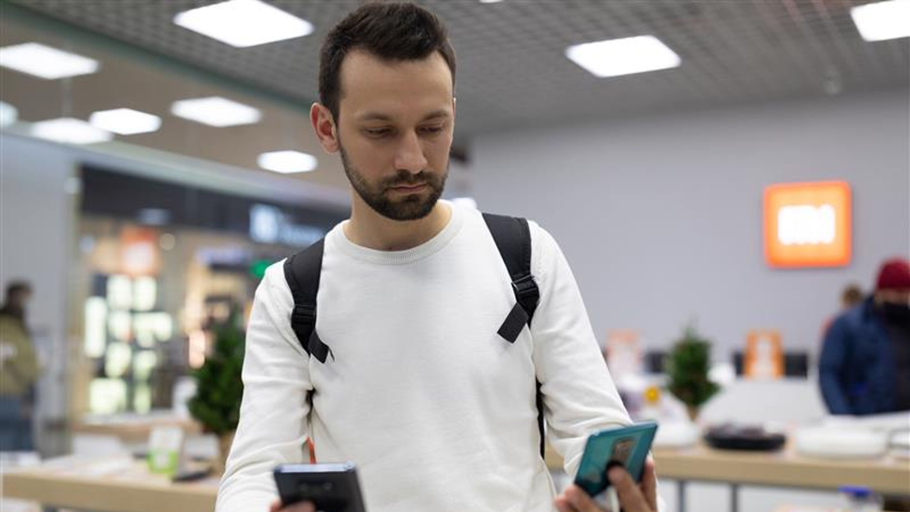 Handsome man checking out phone 