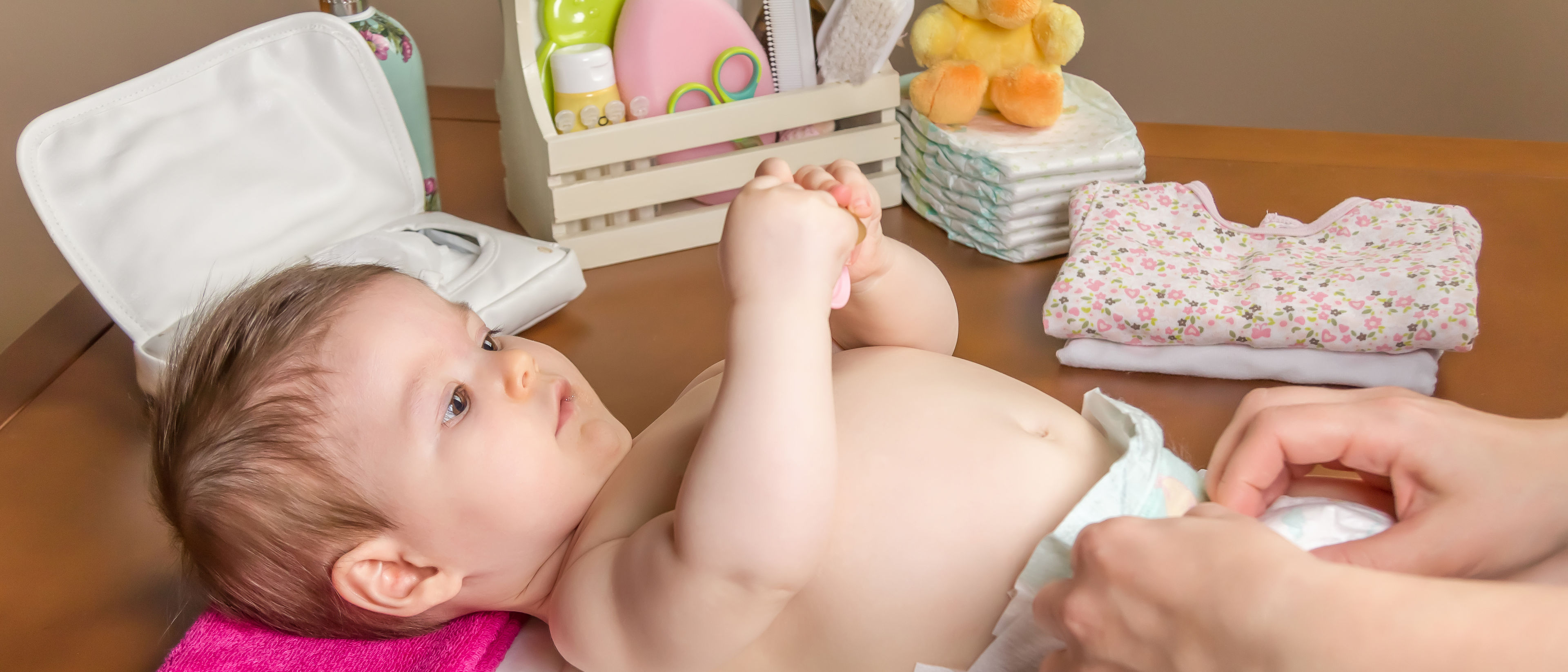 Mother Changing diaper for baby