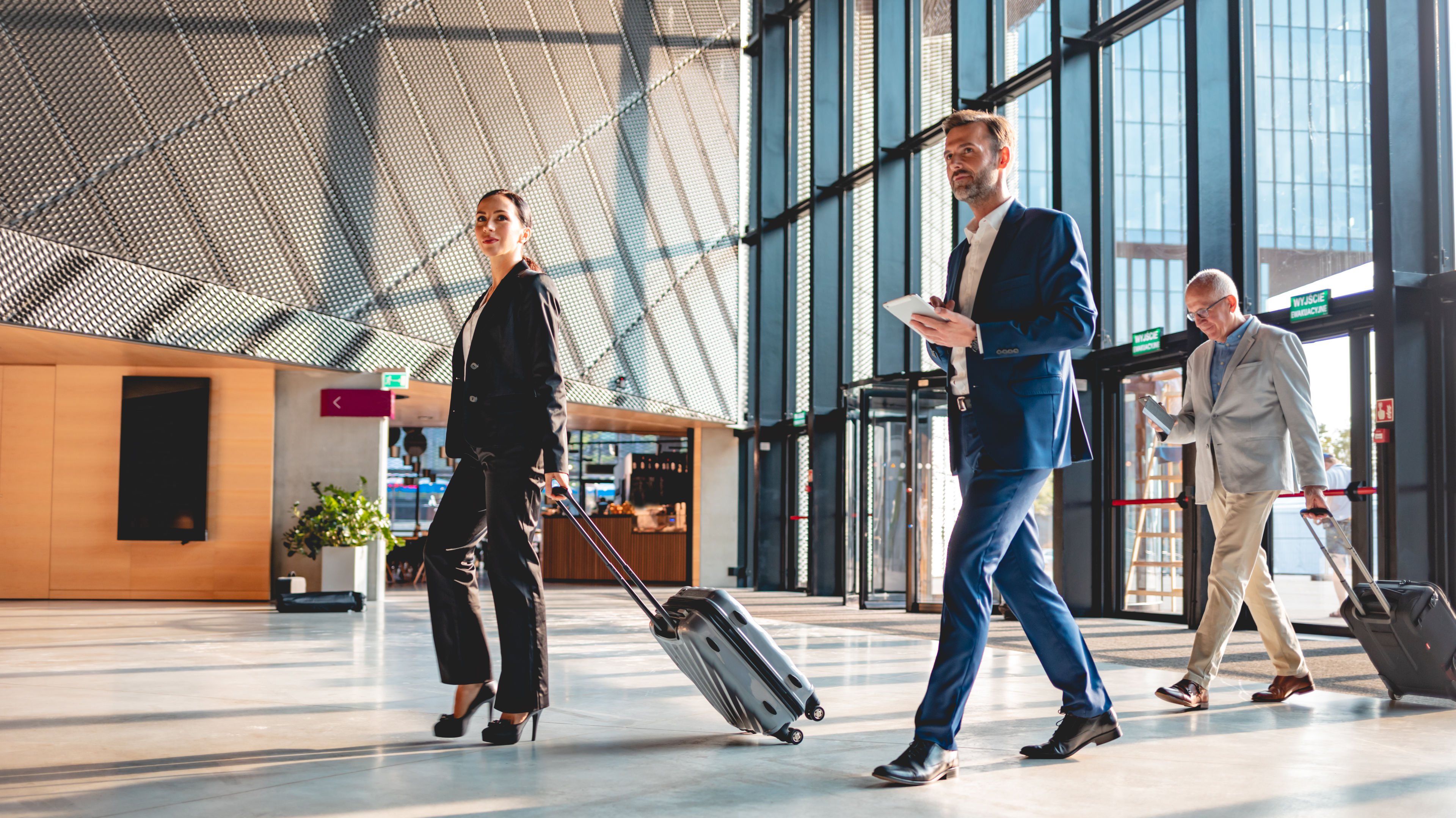 Some people in an airport during a business trip 