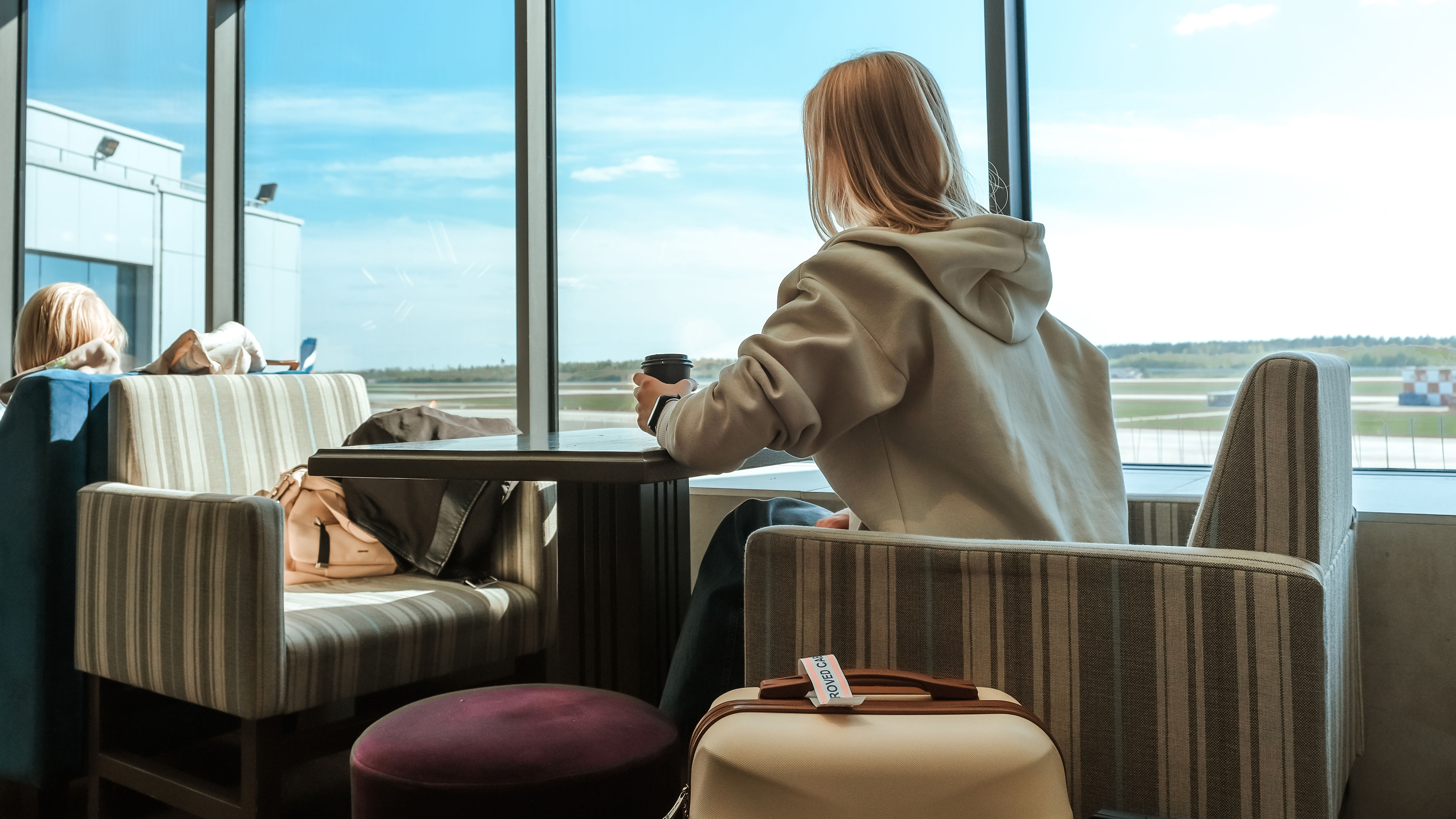 Woman in airport lounge